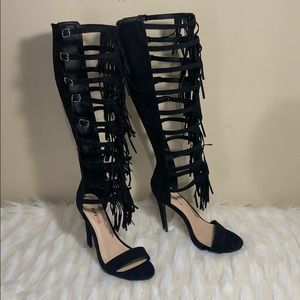 Black high fringed heels